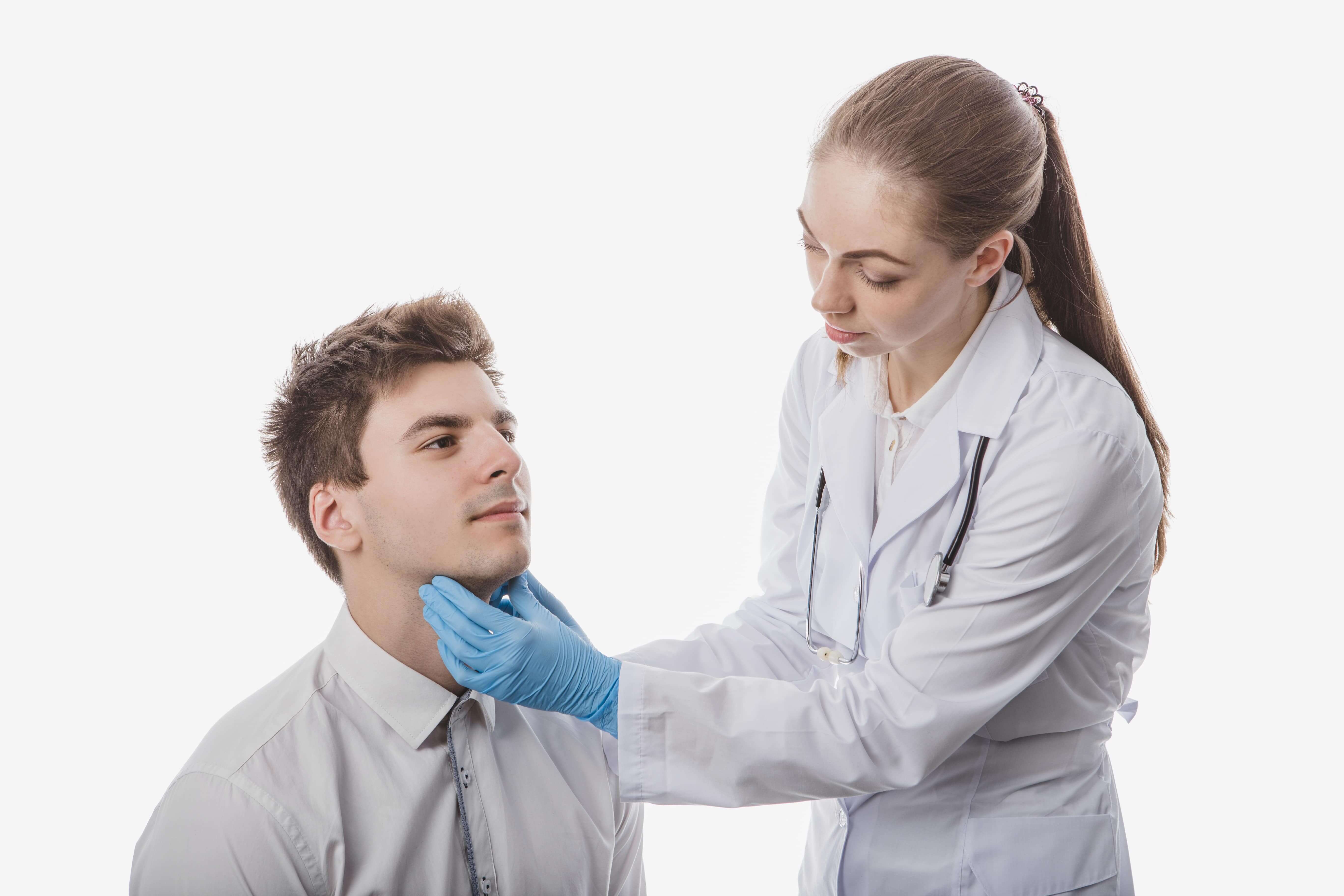 doctor checking throat